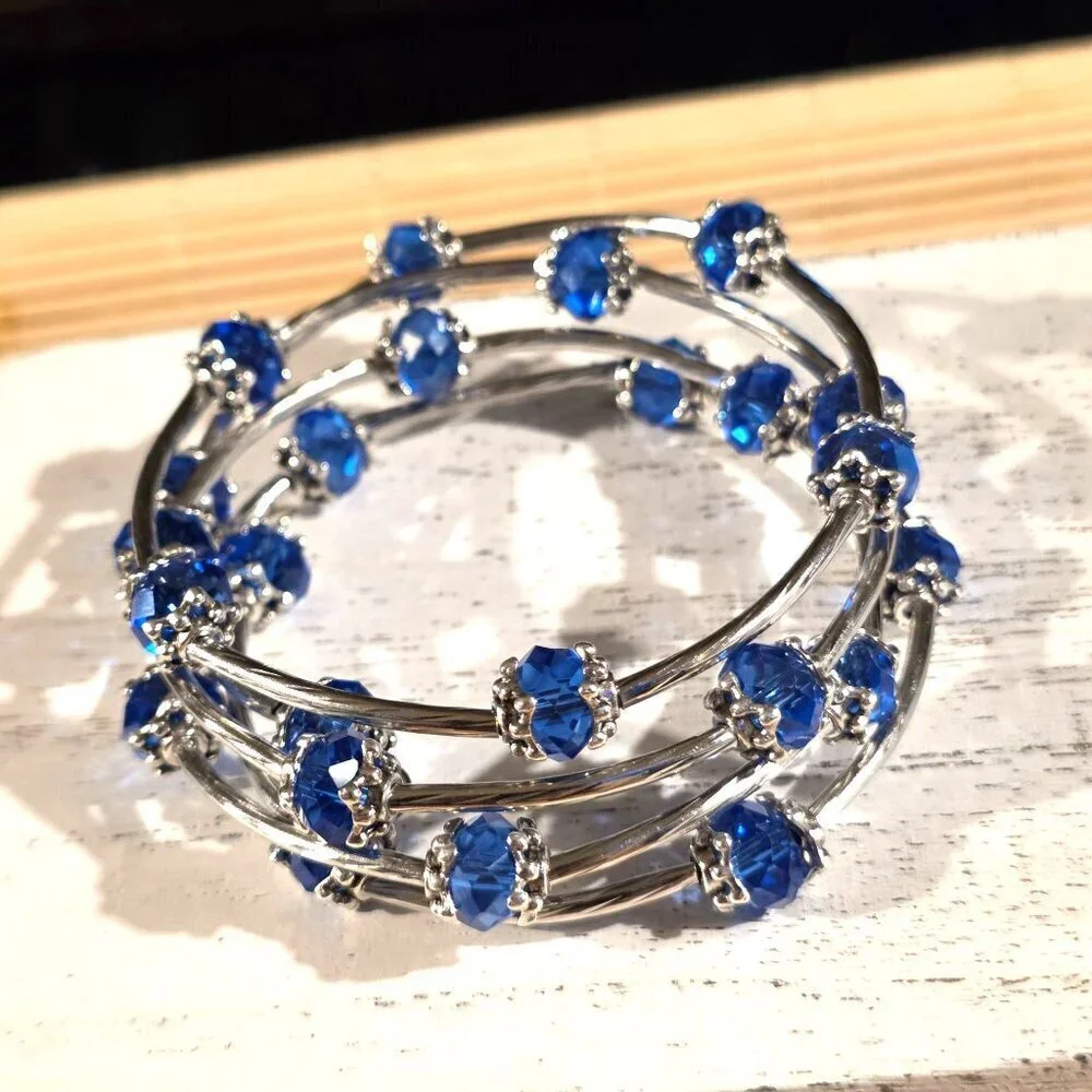 Silver Tone Crystal Wrap Bracelet With Blue Faceted Beads & Filigree Details